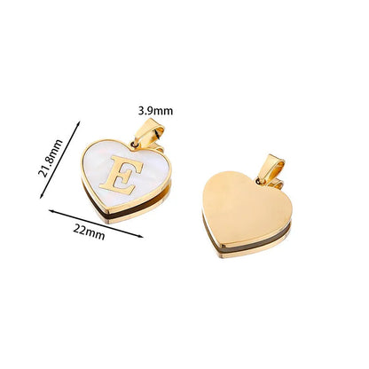 Gold-plated heart necklace with white shell pendant showing letter personalisation option