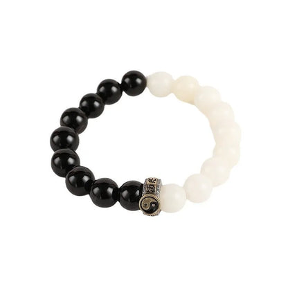 Black and white Tai Chi bracelet with obsidian beads and six-word mantra in geometric pattern