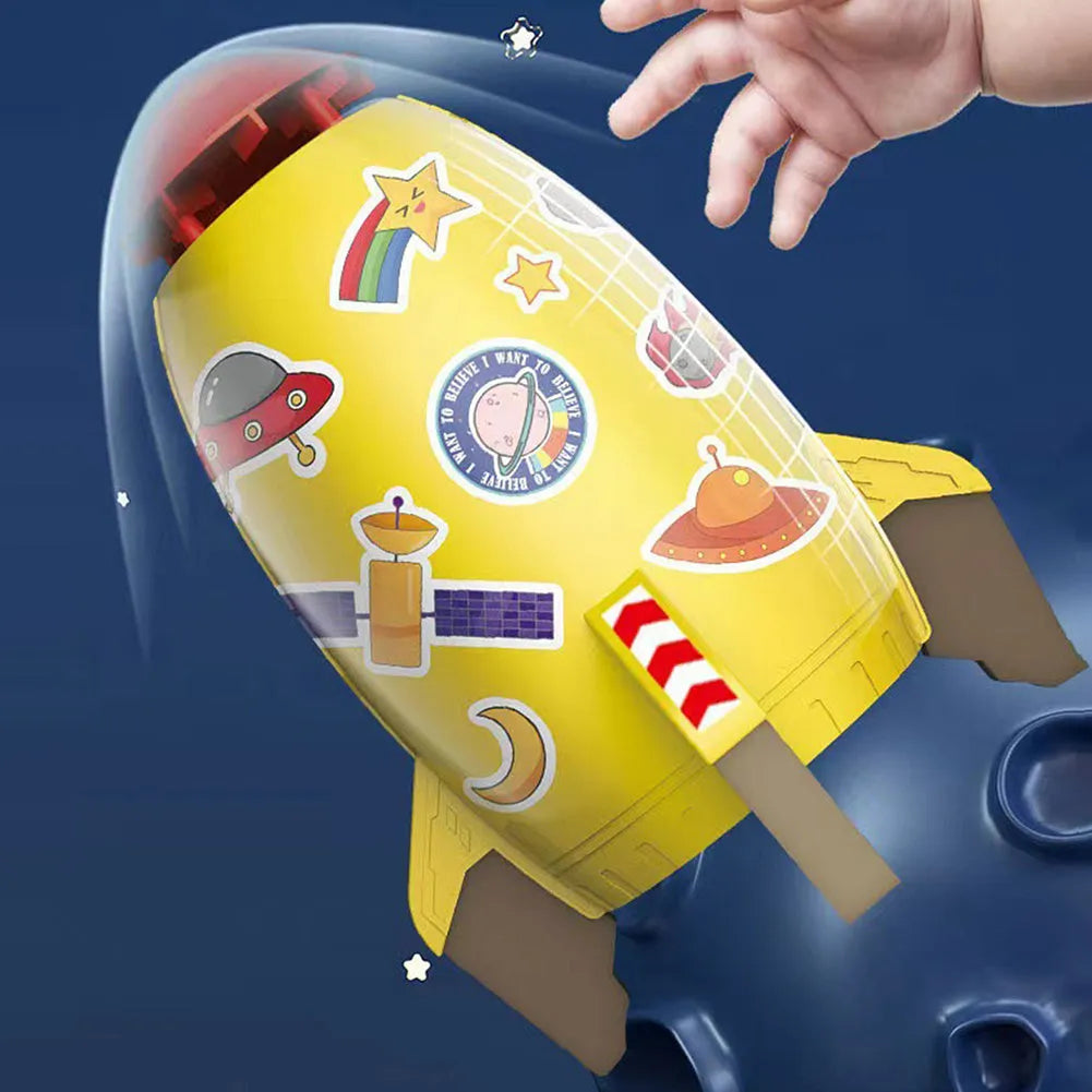 Yellow outdoor water pressure rocket launcher toy for kids on a green lawn.