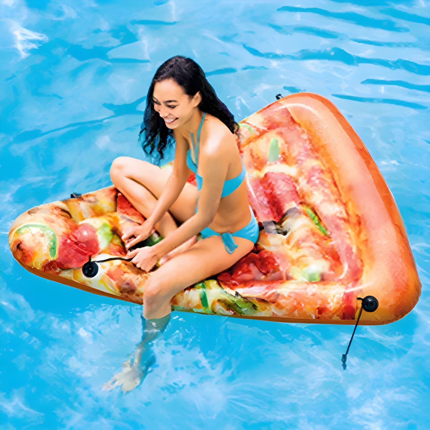 Inflatable pizza slice surfboard floating on water, 175cm by 145cm dimensions