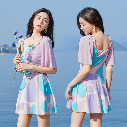 Women's floral high-waist one-piece swimsuit in light purple and light blue patterns for swimming