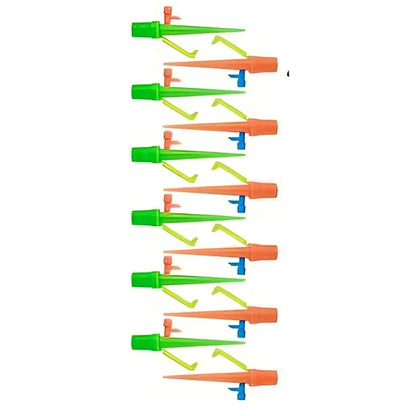 Green and orange plastic garden watering spikes measuring 16.5cm for plant irrigation