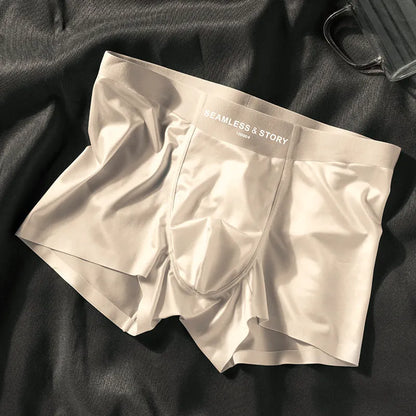 Men's solid colour satin ice silk boxer shorts laid flat, showing mid-waist design.