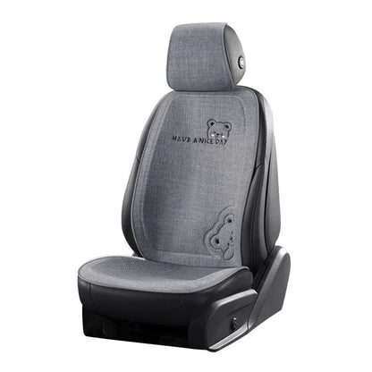 Car seat cushion set showing a linen cushion and separate lumbar support pillow in a choice of five colours.