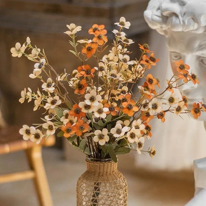Bundle of four artificial dried flowers in orange, white, pink, and champagne colours for rustic decor