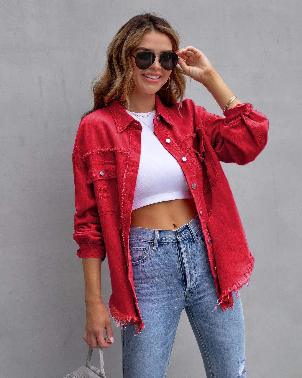 Stylish ripped denim jacket for trendy women in a variety of vibrant colors