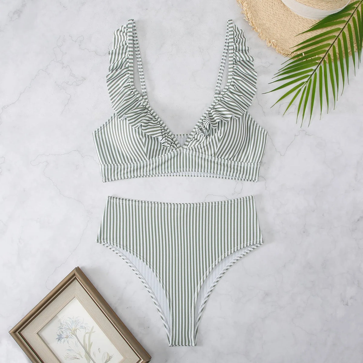 Women's retro striped split chest bikini swimsuit on a hanger