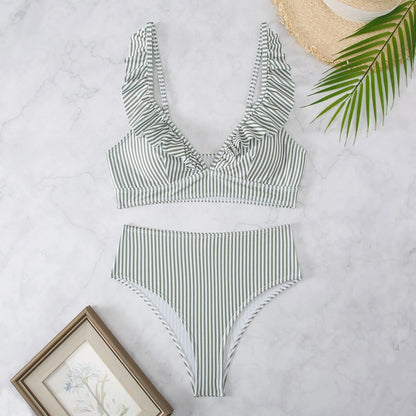 Women's retro striped split chest bikini swimsuit on a hanger