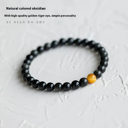 Black obsidian stone bracelet with geometric beads in unisex Korean style.