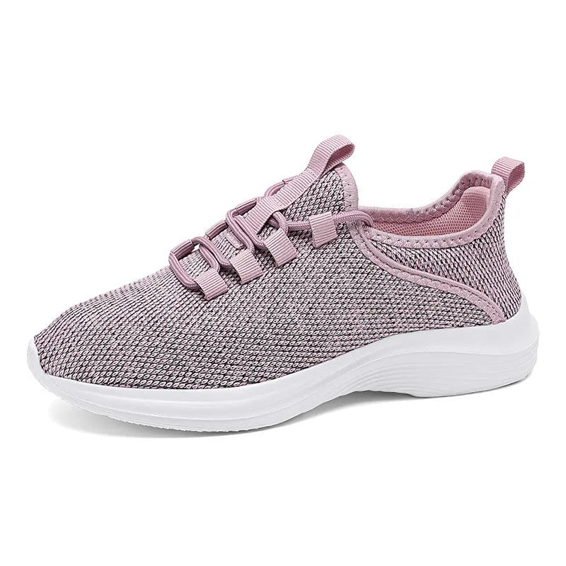 Women's casual sneaker with breathable mesh upper and lightweight EVA sole in low-top round-toe design available in black, pink and grey for summer, spring and autumn leisure wear with lace-up front closure