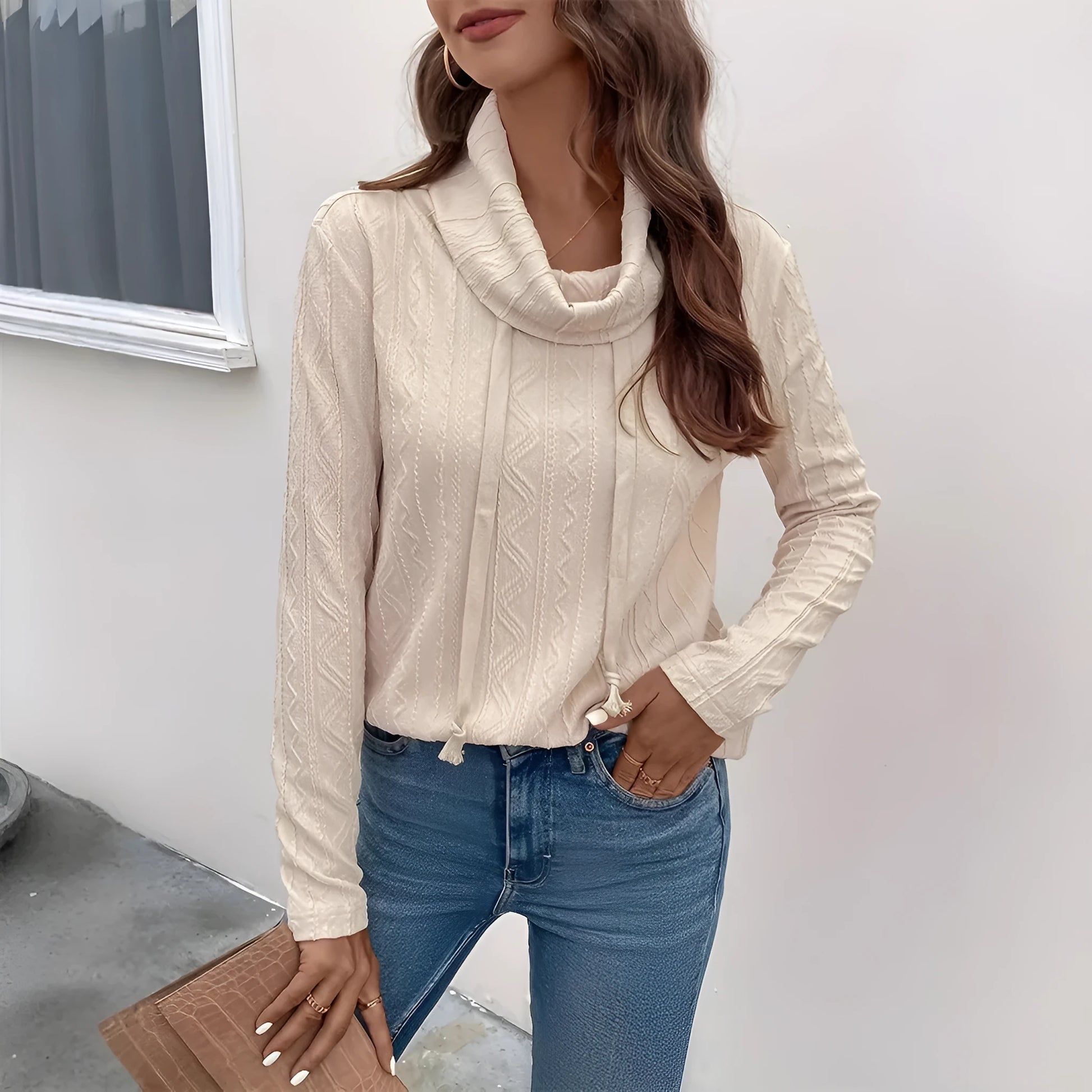 Apricot coloured women's hooded pullover sweater with drawstring and long sleeves