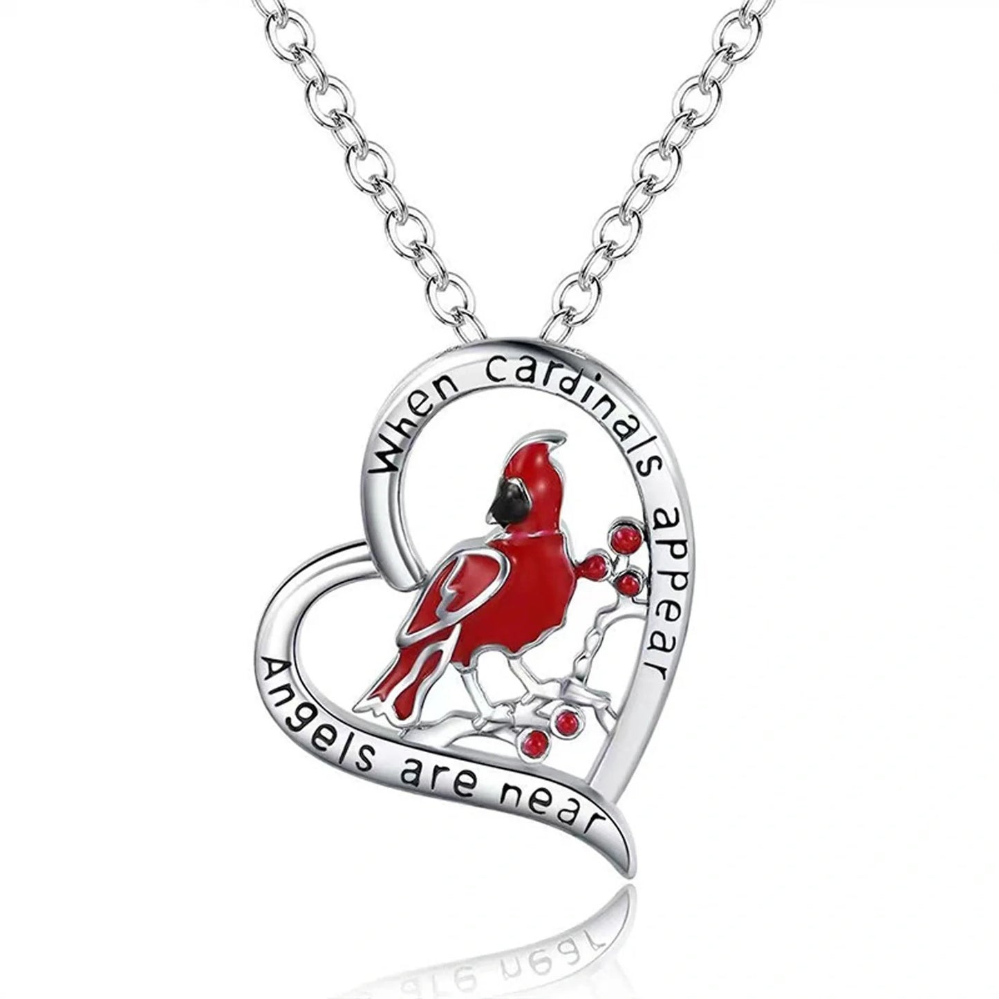 Elegant heart-shaped cardinal pendant necklace with a silver finish, perfect for gifting.