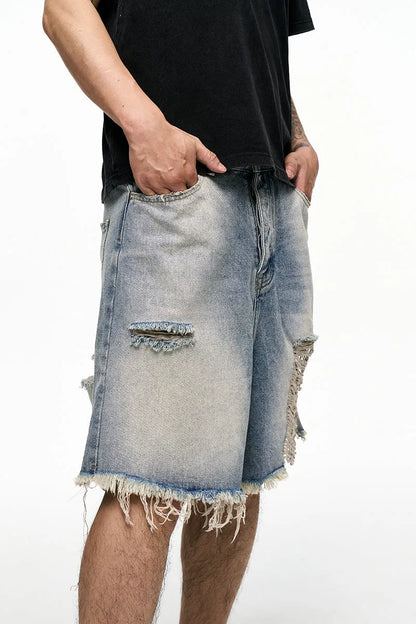 Men's light blue baggy denim shorts with retro washed finish and wide leg cut