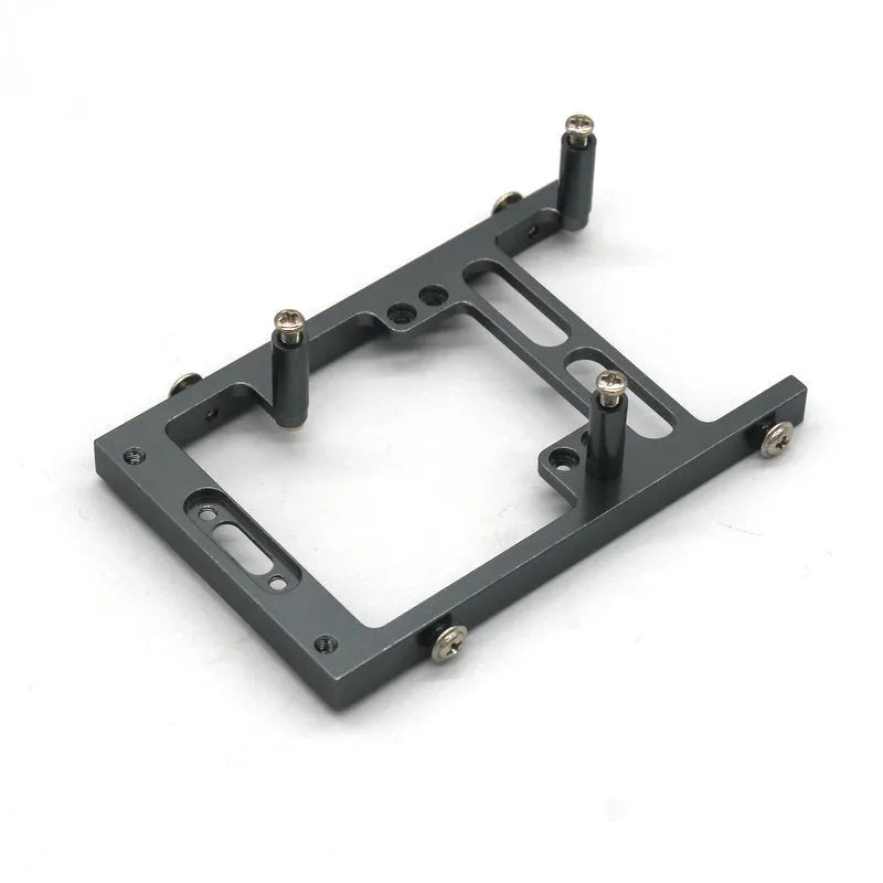 Grey alloy remote control car parts including front bar, beam, axles, and motor housing for 1:24 scale military model builds