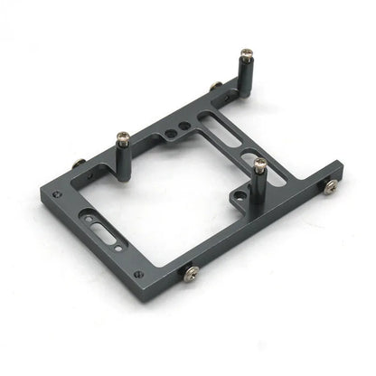 Grey alloy remote control car parts including front bar, beam, axles, and motor housing for 1:24 scale military model builds