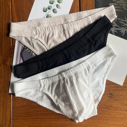 Men's solid colour pure cotton triangle underwear briefs on a mid-waist fit model