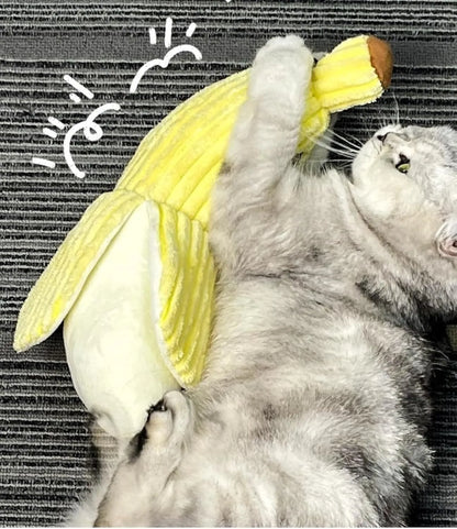 Yellow soft plush banana cat toy with green leaf, measuring 13 inches long, on a plain background.