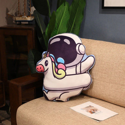 Soft plush astronaut pillows in various space-themed designs, including rockets, spacecraft, and more