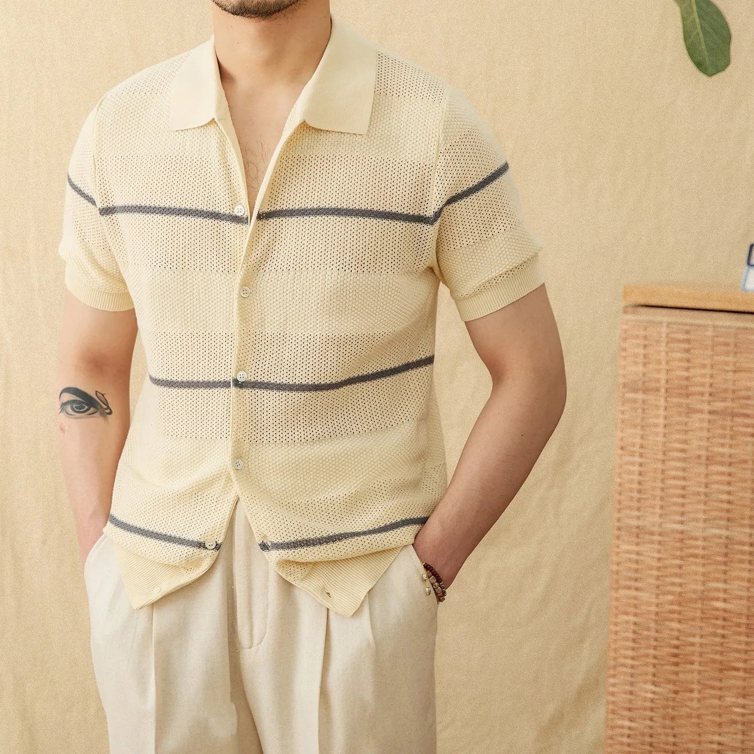 Camel coloured short sleeve lapel cardigan made from a thin linen and cotton knitted fabric.