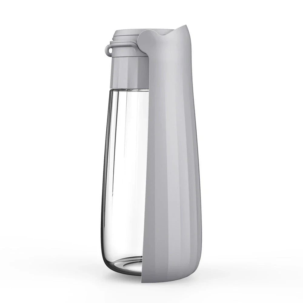 Portable folding dog water bottle with large 550ml capacity, available in multiple vibrant colors