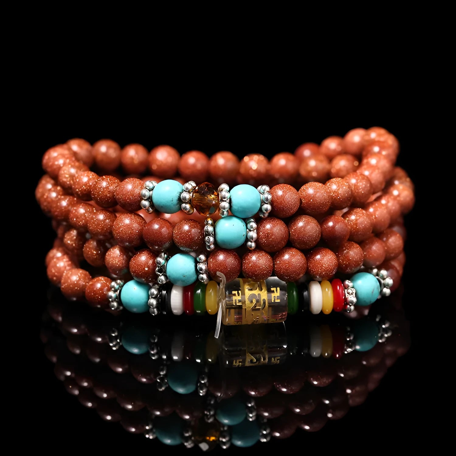Women's golden star stone colour bracelet with 108 nugget sand pieces showing mantra text and fu character design