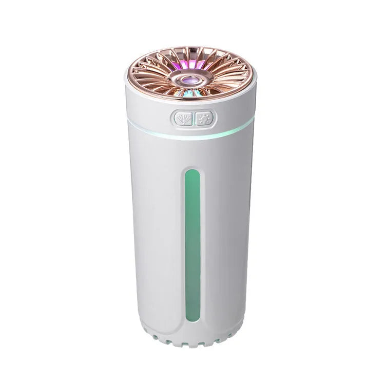 Black portable humidifier with LED lights beside car cup holder showing mist output
