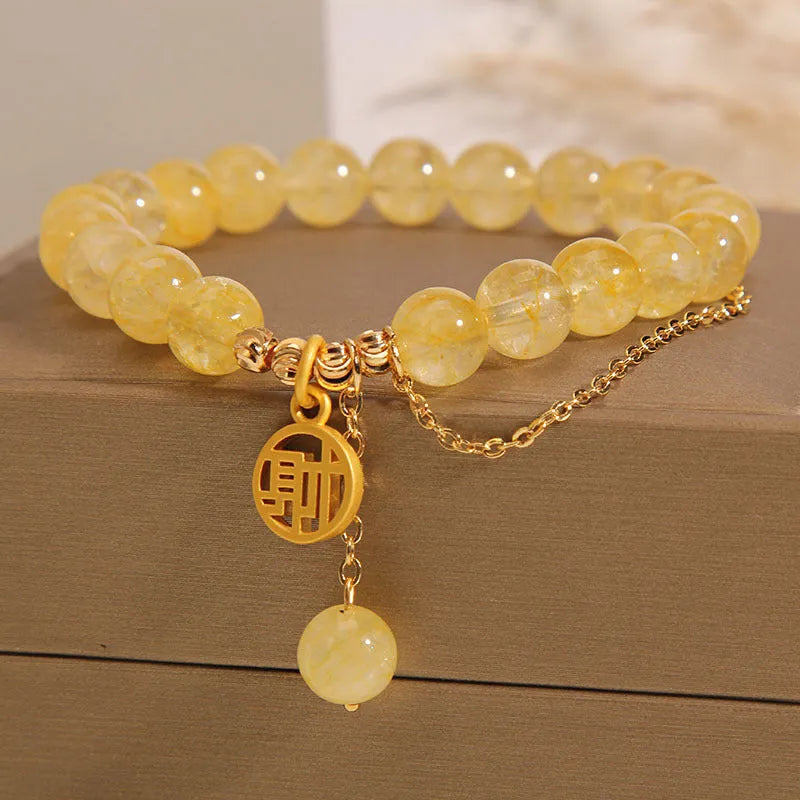 Natural stone citrine bracelet with Chinese character design and decorative tassel for women