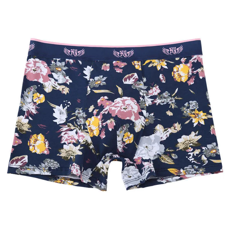Men's cotton boxer shorts with floral print, showcasing the U-shaped convex design and mid-waist fit.
