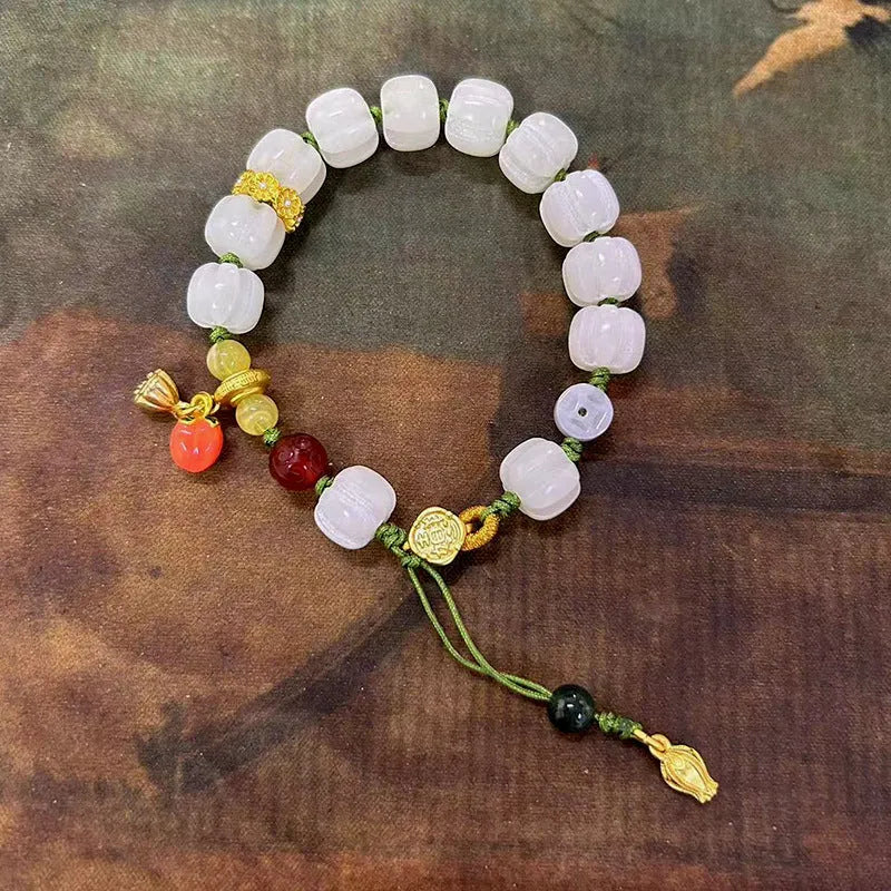 White jade Bodhi bracelet with lotus and pumpkin beads on open rope design