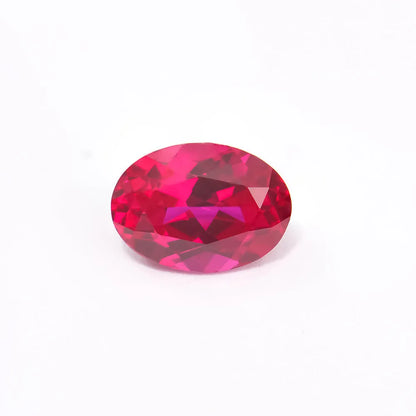 Synthetic pigeon blood red ruby gemstone showing egg shape, round, and princess square cuts
