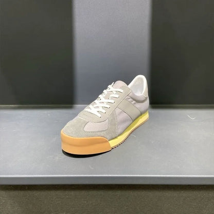 Men's black cow suede and mesh summer sports shoe with mid-heel and herringbone toe pattern on a white background.