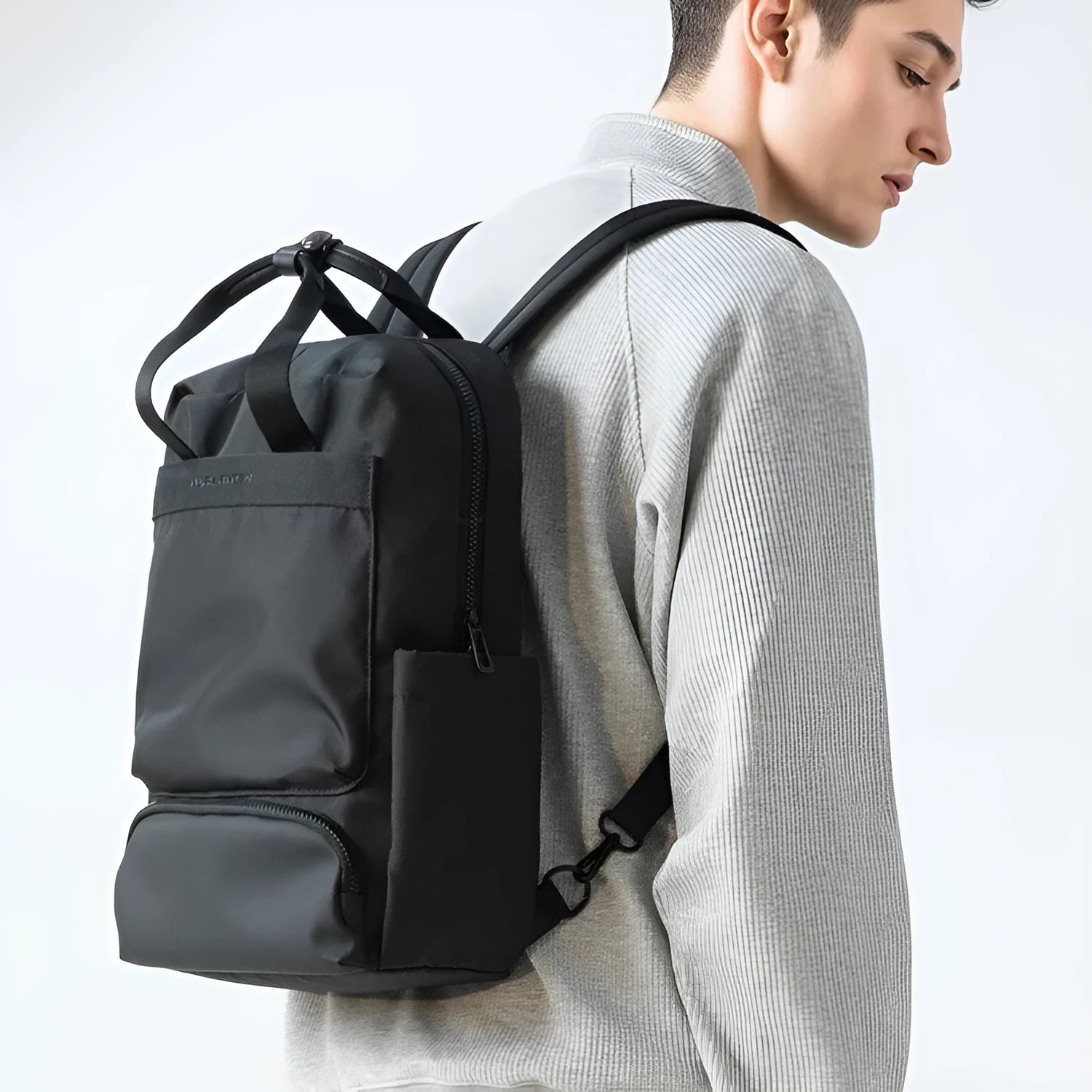 Black Oxford cloth computer backpack with 20-35 litre capacity for laptop storage