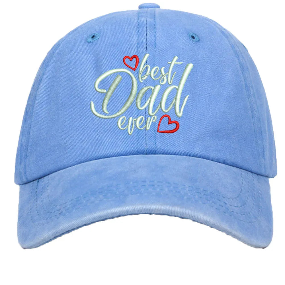 Washed cotton baseball cap with embroidered letters on dome crown, shown in adjustable fit.