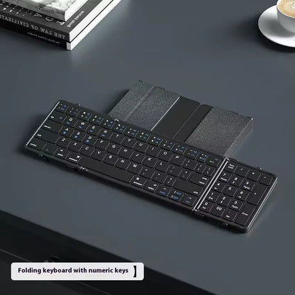 Black portable folding Bluetooth keyboard for tablets and mobile phones, shown folded.