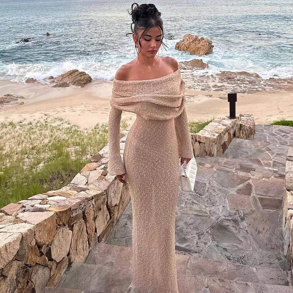 One-shoulder knit maxi dress in various colors, featuring a high-waisted silhouette and flowing skirt for a flattering and stylish look.