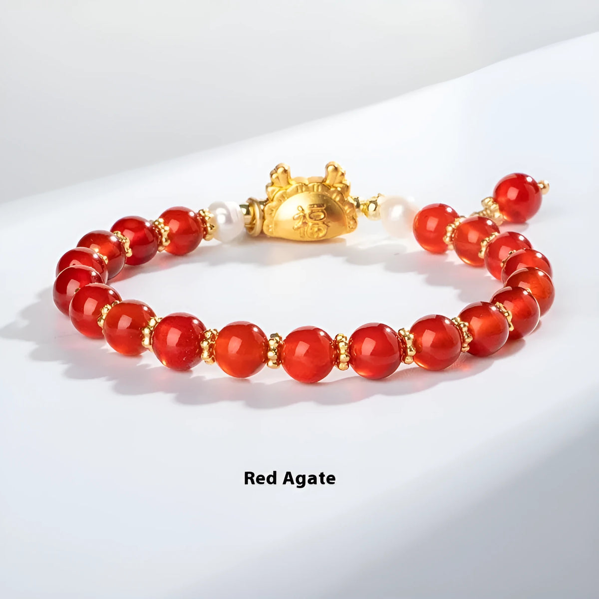 Natural agate and crystal bracelet with 8mm diamond-cut beads on a wrist.