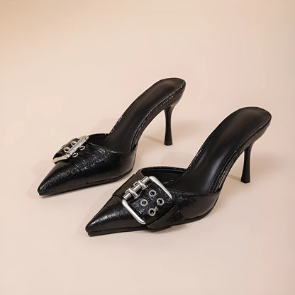 Black women's high heels with pointed toe, ankle strap, and decorative buckle.