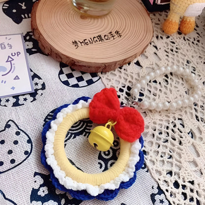 Handmade Snow White plush yarn car hanging ornament, shown as a pendant, with option for red wind chimes.