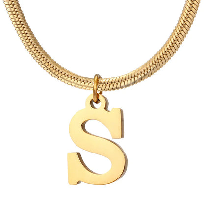 Elegant gold A-Z letter pendant necklace on a snake chain