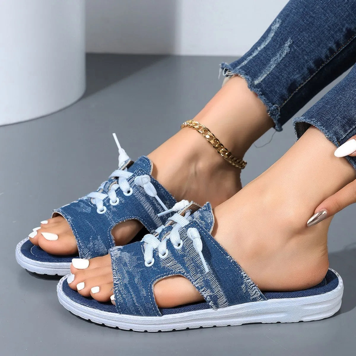 Blue Roman style flat canvas slippers with rubber soles for women in various sizes