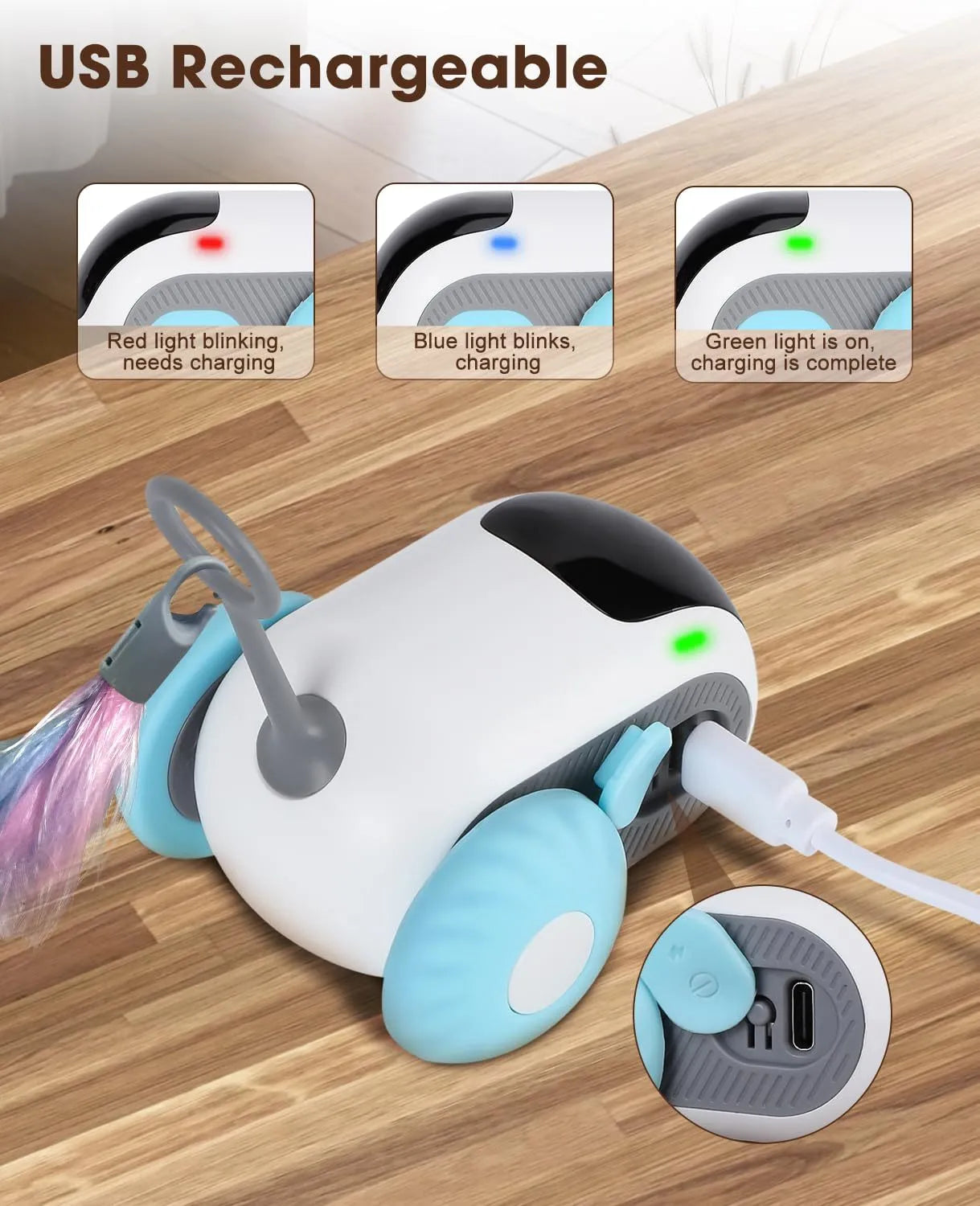 Blue remote control cat toy car with feather teaser on plastic chassis showing USB charging port