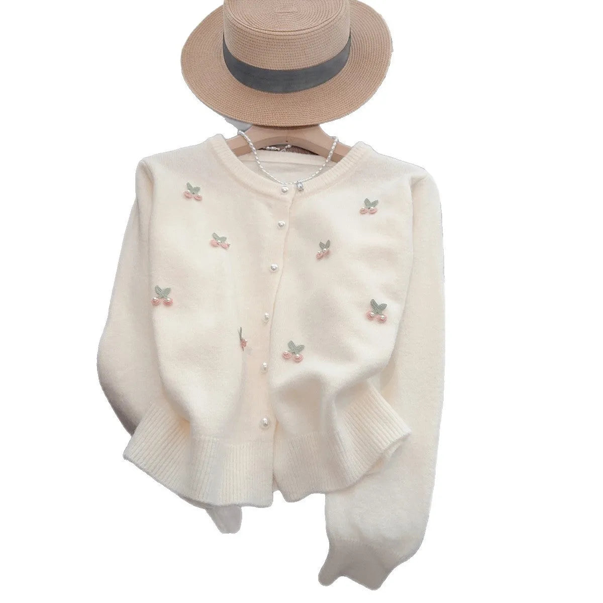 Pink women's slim fit cashmere cardigan coat with beaded details on a round neck.