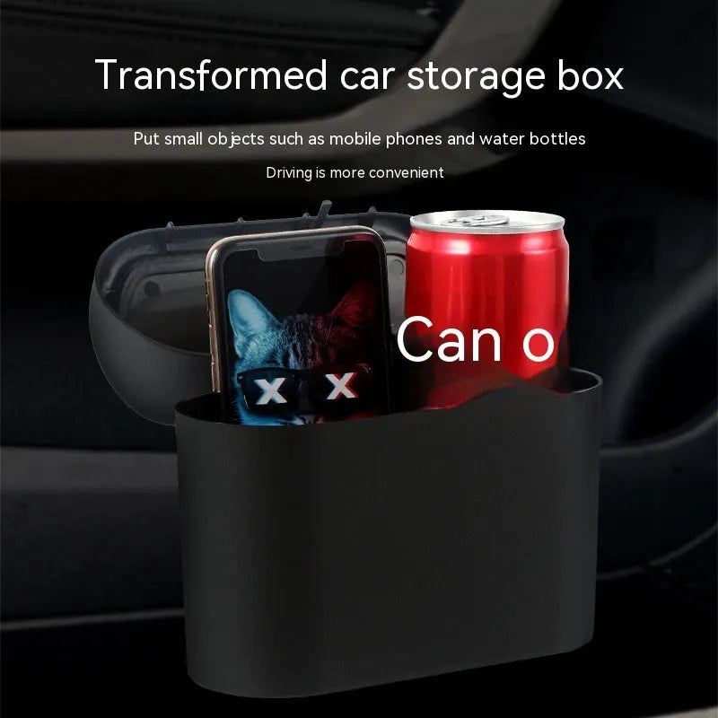 Black folding car trash can with handle mounted on vehicle seat
