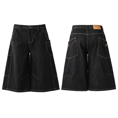 Black retro washed cropped denim trousers for men on a hanger