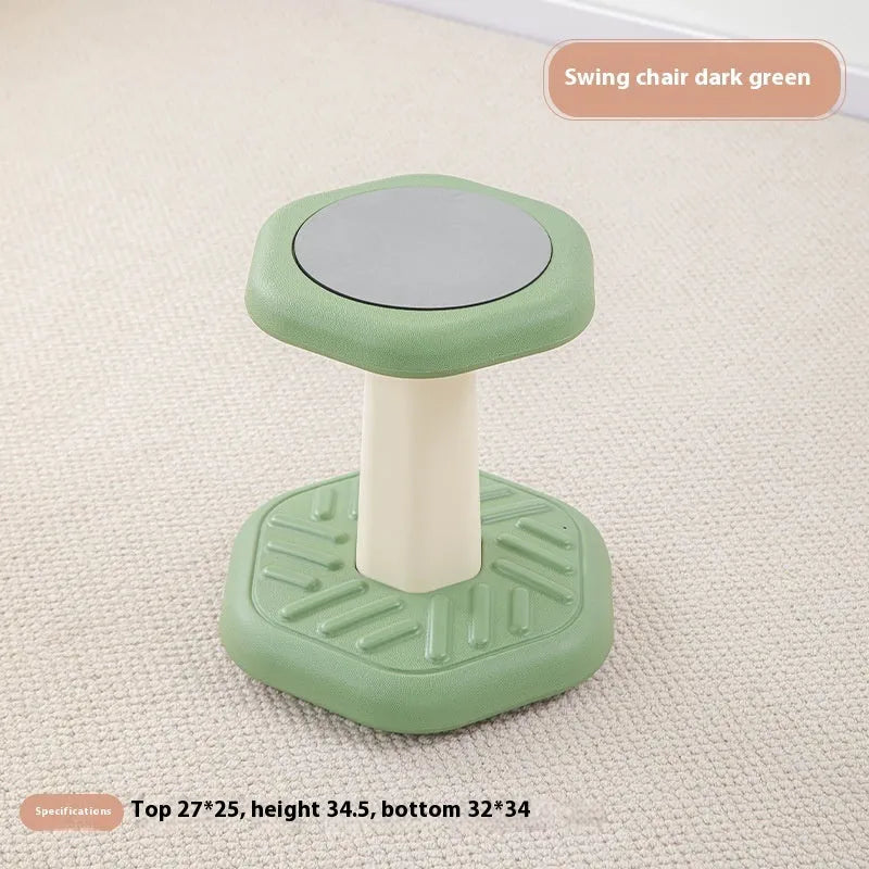 Balance children's plastic rocking stool in blue colour on a wooden floor.