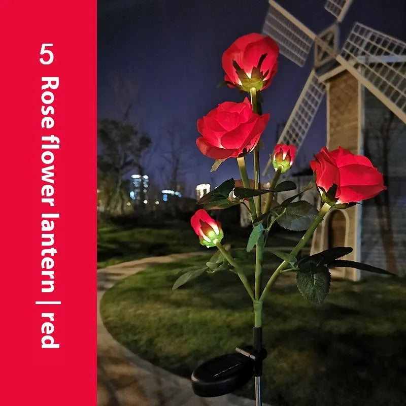 Colourful solar-powered LED lawn lamp in a flower shape for garden decoration.