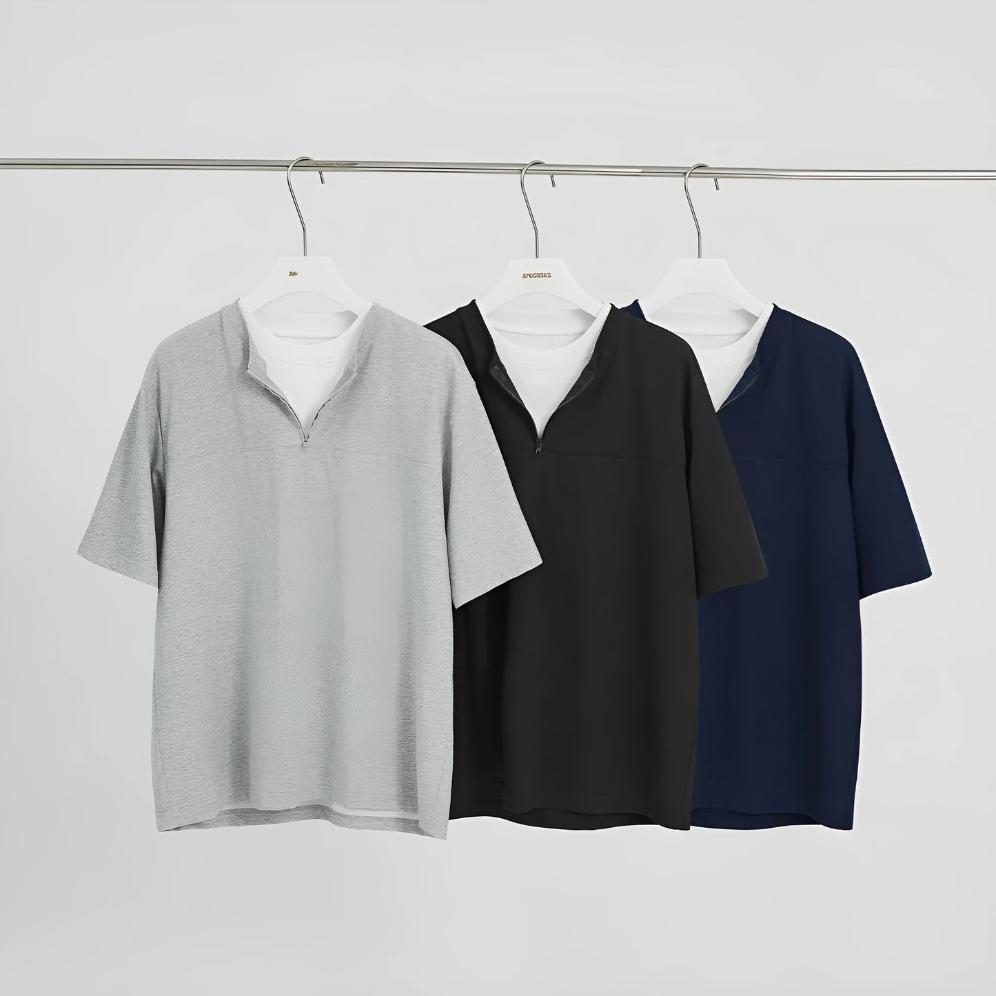 Solid colour loose fit cotton blend pullover top with patchwork collage detailing on a model.