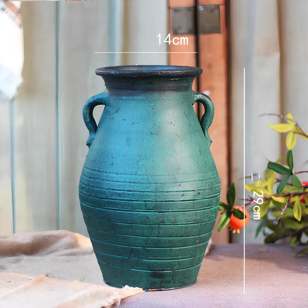Ceramic mosaic vase with dried flower arrangement, handcrafted surface detailing
