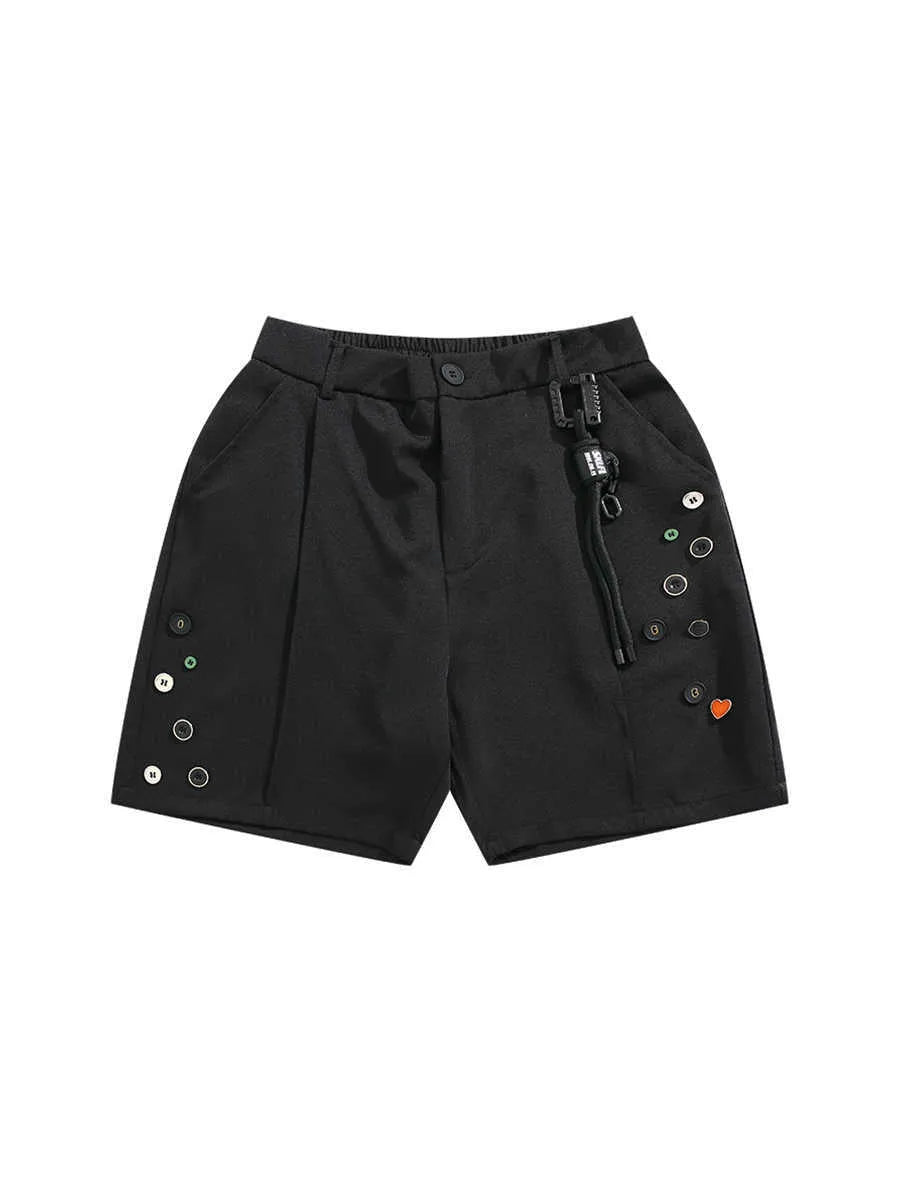 A pair of black loose-fit semi-elastic shorts with a colour button and zipper fly.