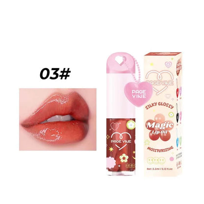 Colour-changing lip gloss with love pendant charm on applicator, from the Princess series.